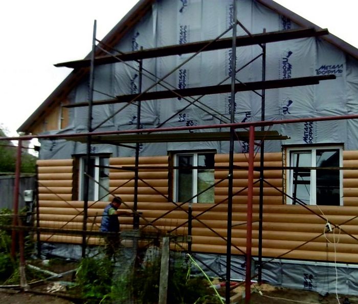 утепление стен дома из бруса
