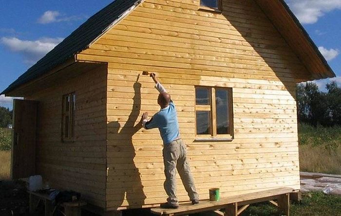 покраска каркасного дома цена